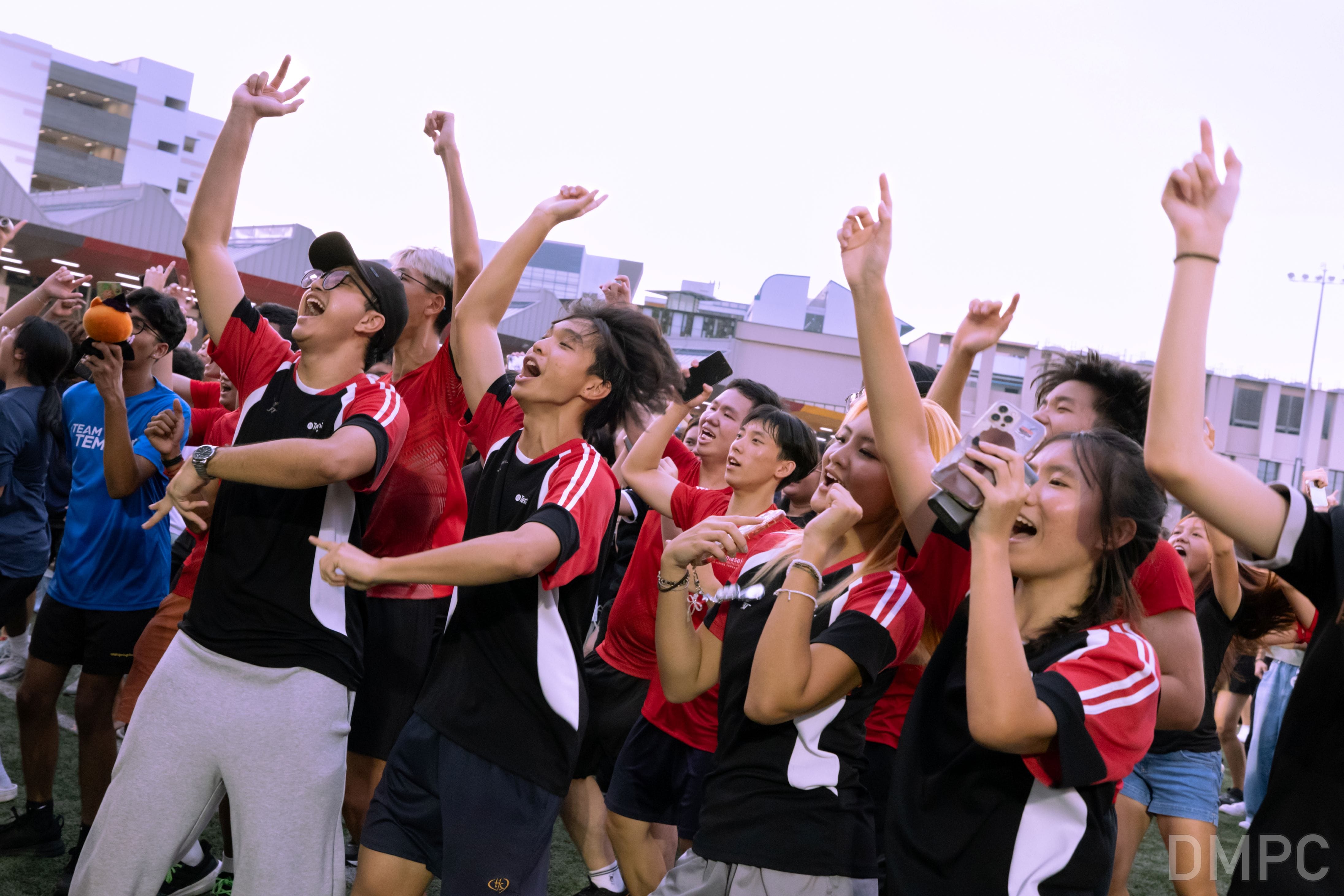 Image of TP students cheering at a concert